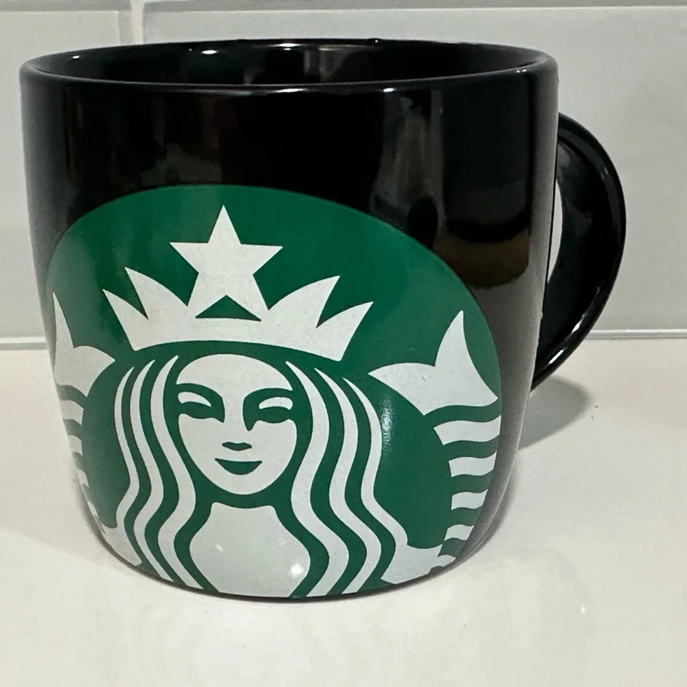 New Starbucks black ceramic mug featuring the iconic green white mermaid Logo